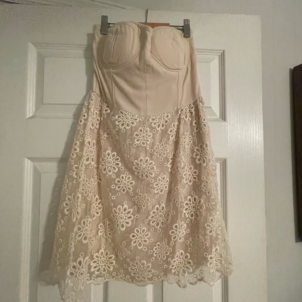 Cream strapless dress with flower skirt
